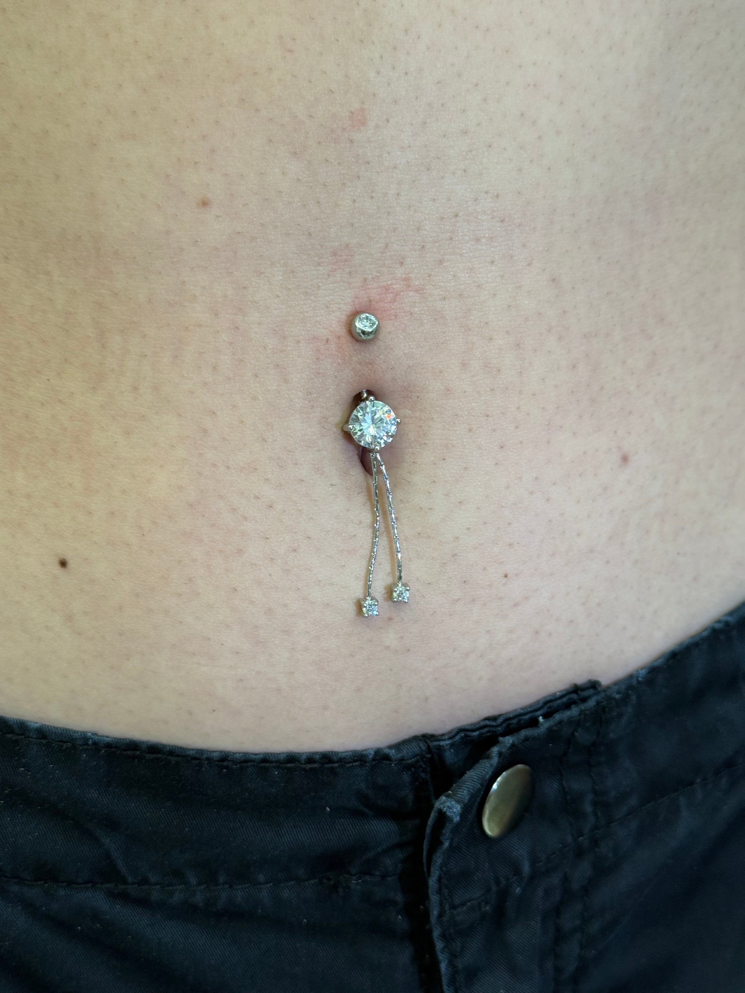 Piercing Ombelico punto luce